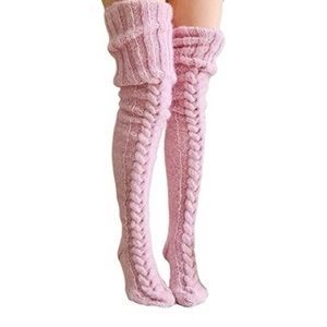 Woman’s thigh high cable knit stockings.